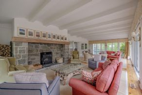 Family room fireplace - Country homes for sale and luxury real estate including horse farms and property in the Caledon and King City areas near Toronto