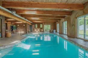 Indoor pool with sauna, bar, fireplace - Country homes for sale and luxury real estate including horse farms and property in the Caledon and King City areas near Toronto