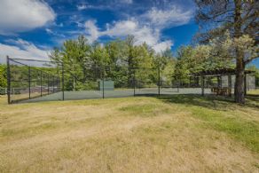 Tennis court with seating area - Country homes for sale and luxury real estate including horse farms and property in the Caledon and King City areas near Toronto