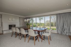Dining room with views and fireplace - Country homes for sale and luxury real estate including horse farms and property in the Caledon and King City areas near Toronto